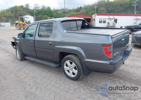 2014 Honda Ridgeline Rtl z USA, uszkodzony, nr VIN 5FPYK1F50EB003633